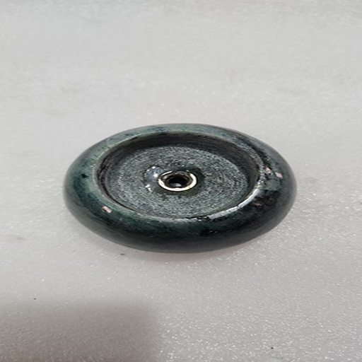 2.5 by 1.25 inches Green Aventurine tea light with 1.75 inch hole